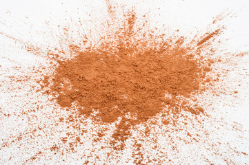 Pile cocoa powder on white background