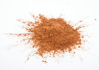 Pile cocoa powder on white background