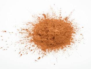 Pile cocoa powder on white background