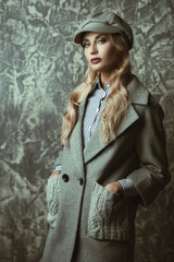 blonde in a trendy coat