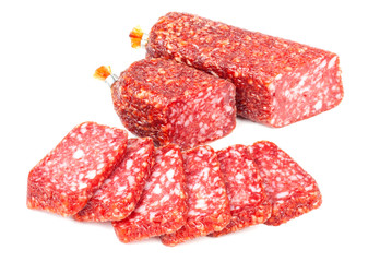 Sliced smoked sausage on white background