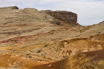 Panoramic view of an arid cliff landscape with trekking pathways in the Atlantic Ocean (Madeira, Portugal, Europe)