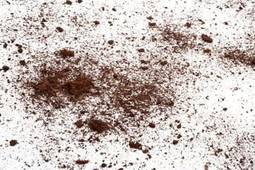 Scattered soil on a white background