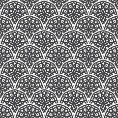 Vector seamless pattern with scales and ornament of mandala. Vector black and white seamless background. The Art Nouveau style. Best for fabric, wrapping paper and home decor