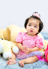 cute baby girl in a pink dress