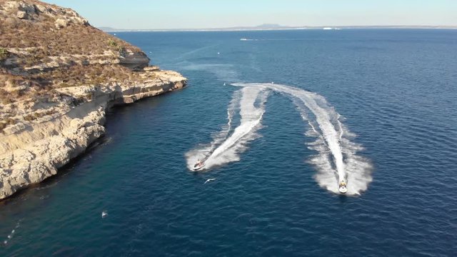 two jetskis cruising 