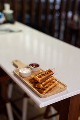 waffles stick with tomato and mayo sauce