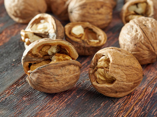 Walnuts lie on a light colored background