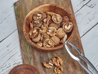 Walnuts lie on a light colored background
