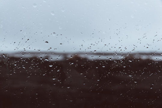 Car window view with rain drops, in Vestrahorn stokksnes