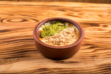 milk dessert with nuts  (sütlaç) in turkey