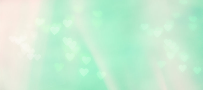 abstract pastel green background with hearts