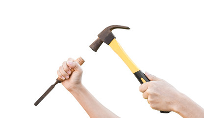 Male hands working with old rusty hammer and chisel isolated on white background with clipping path.
