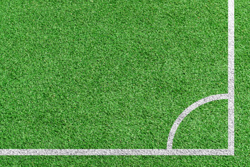 Top view grass soccer in corner kick position.