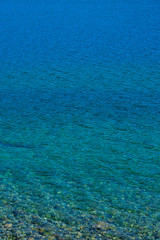 Fototapeta na wymiar View of Gutierrez Lake and the blue water. Bariloche, Argentina