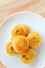 Chinese pastry or moon cake filled with mung bean paste and salted egg yolk