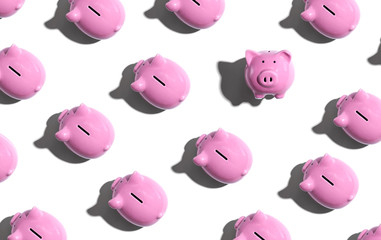 Pink piggy banks overhead view - flat lay