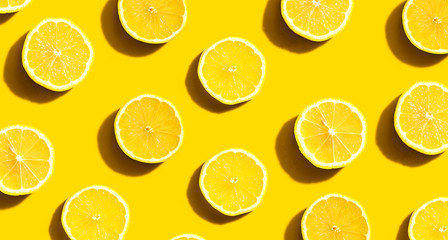 Fresh yellow lemons overhead view - flat lay - Powered by Adobe