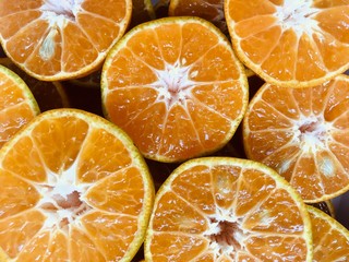 slices of orange on white background