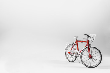 Fototapeta na wymiar Red bicycle on a white background