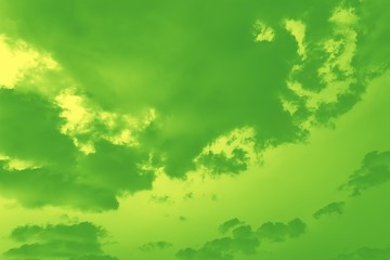 Obraz na płótnie Canvas Sky background. Sky with fluffy clouds, green gradient toned