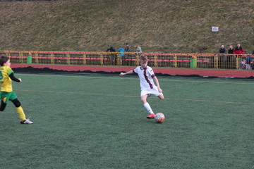 Kid playing football