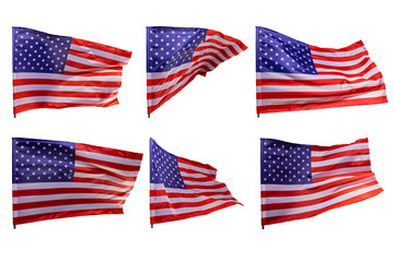 A set of American flags developing in the wind, isolated on a white background.