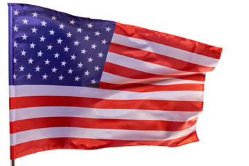 Fototapeta premium American flag flying in the wind, isolated on a white background.