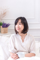 Portrait of beautiful asian young woman sleep lying in bed with head on pillow comfortable and happy with leisure, girl with relax for health and lifestyle concept.