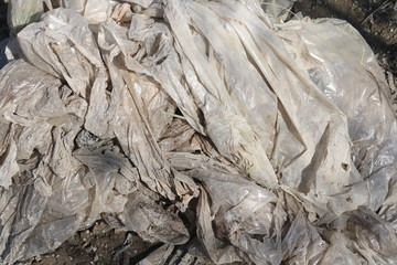Old dirty scary polyethylene as symbol of future environmental disaster due to use of plastic