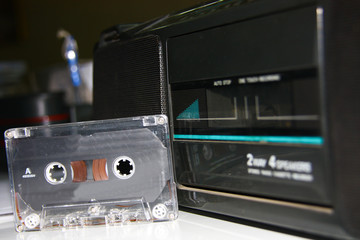 old style cassette tape and tape player, recorder in black color.