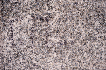 Texture of a part of the wall made of concrete with a small crumb of stone. Architecture.
