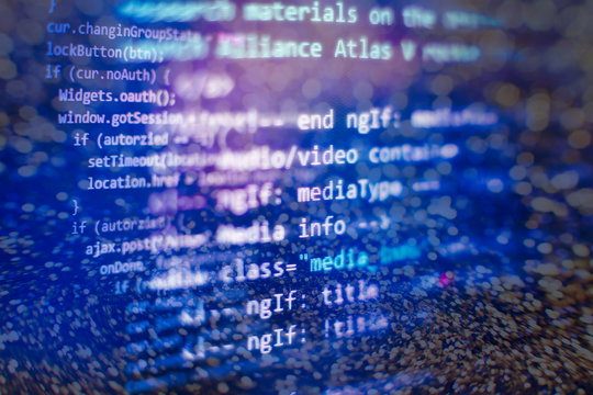 Desktop PC monitor photo. Javascript functions, variables, objects. Project managers work new idea.