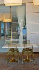 golden chairs and marmor table in Singapore