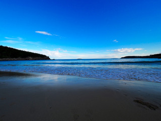 Beach with wave coming in