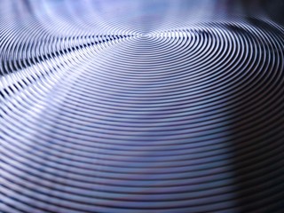 Bottom of metal frying pan, kitchen utensil detail background.