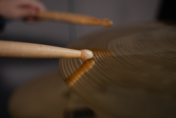 Fototapeta na wymiar closeup of drum sticks, the baton hits the drum drum closeup macro
