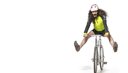 Fototapeta na wymiar Portrait of a scary cyclist on bike