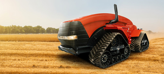 Autonomous tractor working on the field. Smart farming © scharfsinn86