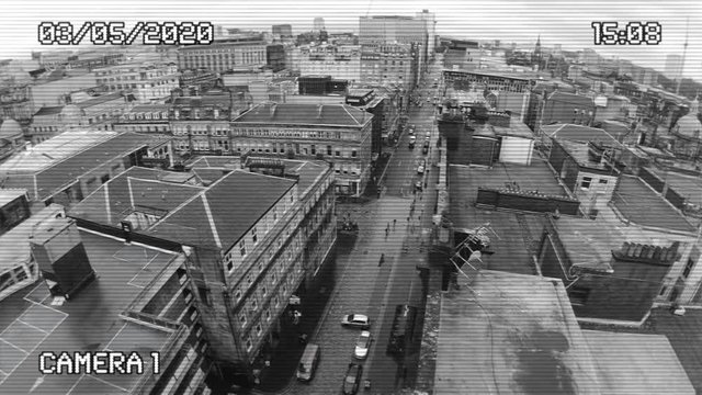 Grainy Birds-Eye CCTV Footage From A Surveillance Camera In A British City Centre For Counter-terrorism