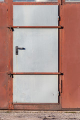 iron door on a factory facade