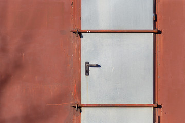 iron door on a factory facade