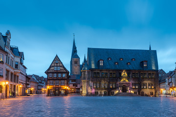 Naklejka na ściany i meble Town hall square of Quedlinburg, Germany in the evening during blue hour