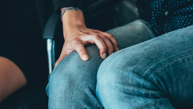 Workplace Harassment. Unprofessional Inappropriate Behavior. Female Boss Hand On Male Employee Knee.