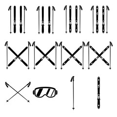 Skiing gear set.  Assortment of skis, poles, and goggles. Silhouette icons. - obrazy, fototapety, plakaty
