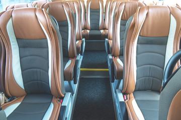 Brown leather bus seats.