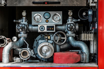 Fire extinguishing system technical device in a fire truck close-up.