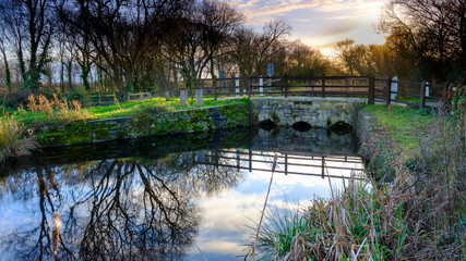Winter sun on the Bridge at the Sea Lock on the Titchfield Sea Canal, Hampshire, UK
