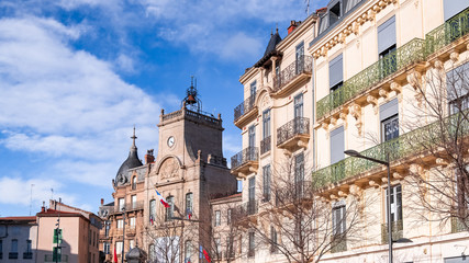 Béziers in France, colorful houses, typical facades in the old center, and the city hall 