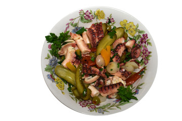 plate with octopus salad isolated on white background